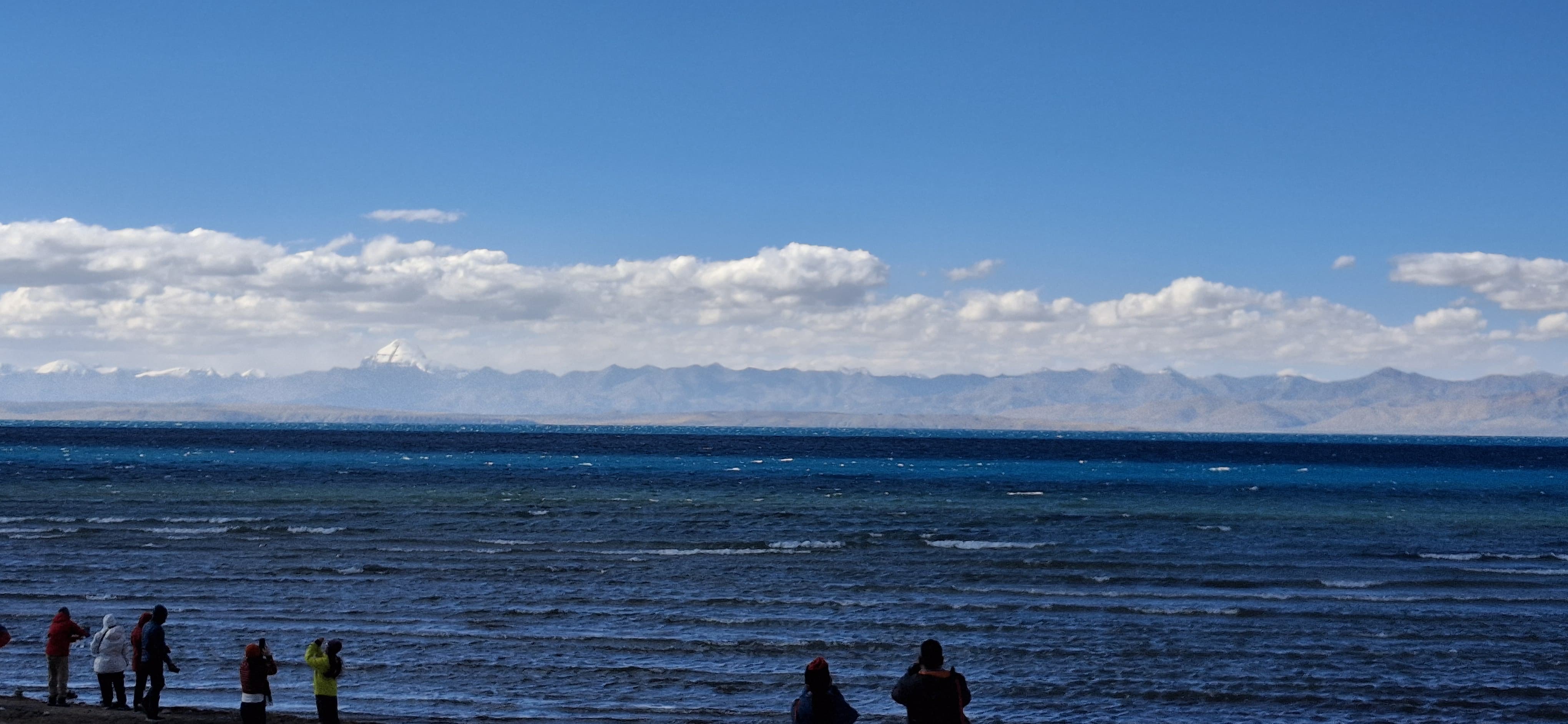 Pilgrims at the shore of Lake Mansarovar