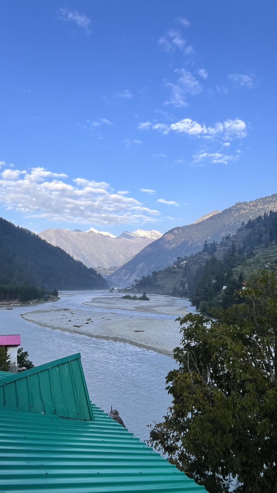 River valley with snow peaks